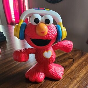 Sesame Street Let's Dance Elmo toy by Playskool Friends (Hasbro). Interactive